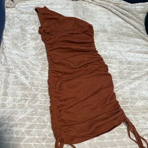 WORN ONCE this just wasn’t for my body type love the one strap and lace on this!